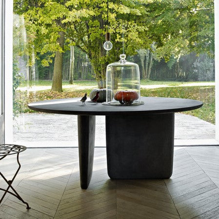 Round Dining Table With Asymmetrical Bases