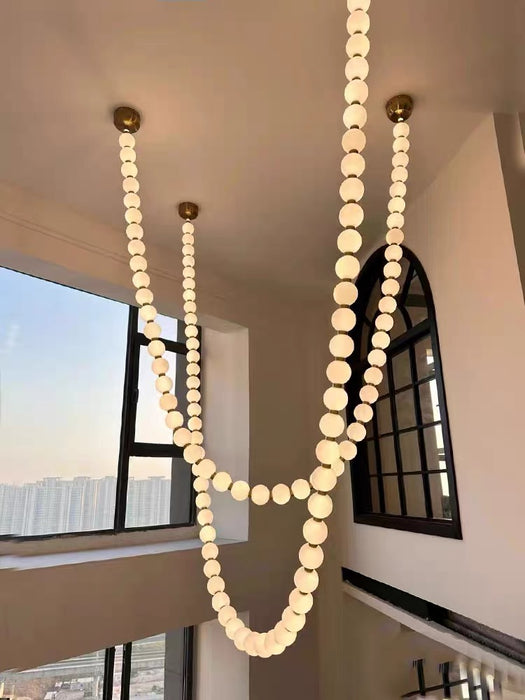 Lampadario moderno e creativo con collana di perle