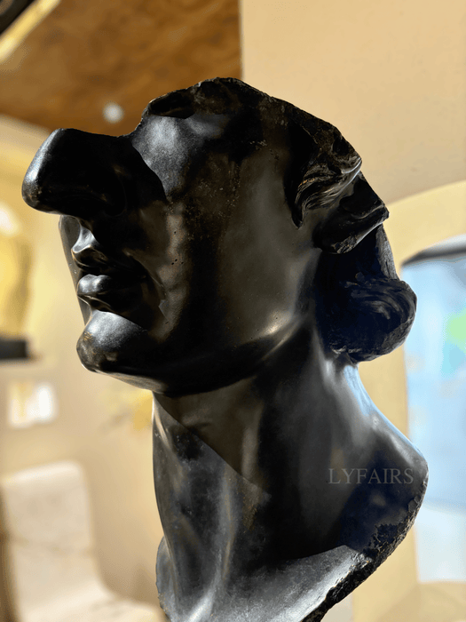 Black Half-Face Sculpture