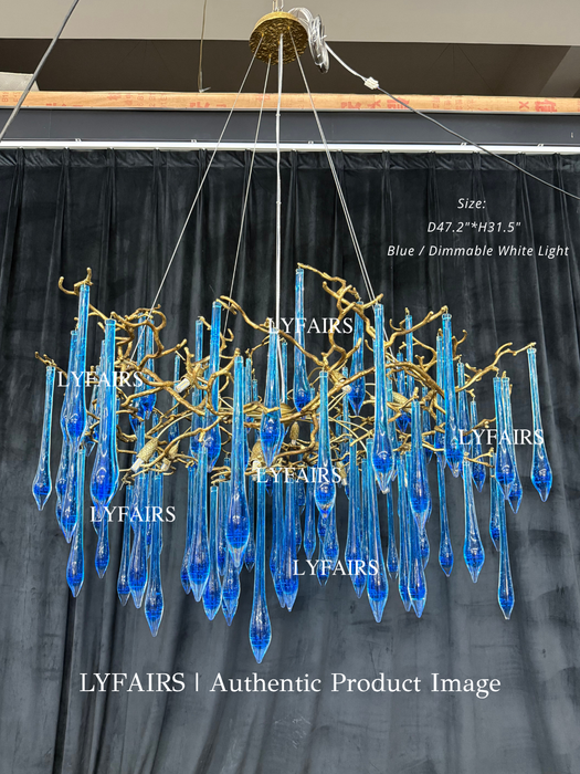 Elegante Candelabro con Gotas de Glaseado en Rama Azul para Comedor