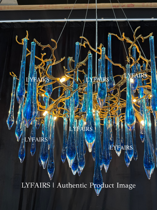 Elegante Candelabro con Gotas de Glaseado en Rama Azul para Comedor