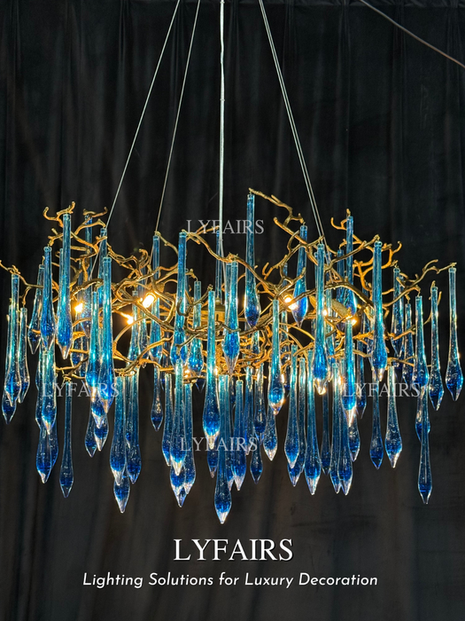 Elegante Candelabro con Gotas de Glaseado en Rama Azul para Comedor