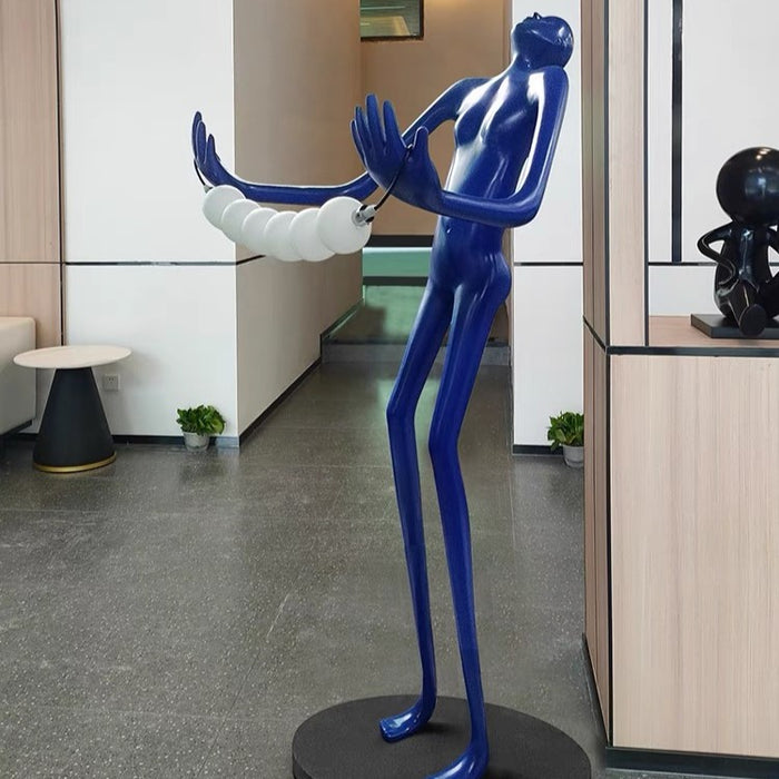 Lámpara de pie de arte de estatua humana con cabeza inclinable