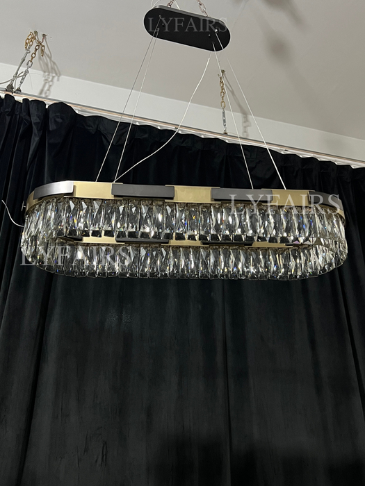 Lampadario di cristallo rotondo/ovale di lusso moderno consigliato dal nuovo designer per soggiorno/sala da pranzo