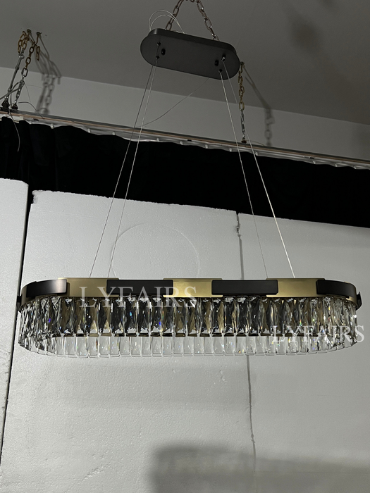 Lampadario di cristallo rotondo/ovale di lusso moderno consigliato dal nuovo designer per soggiorno/sala da pranzo