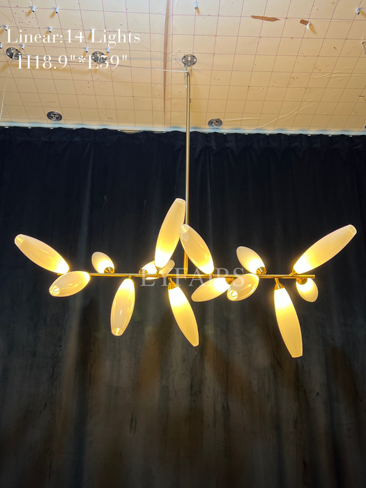 Lampadario minimalista in ferro a forma di chicco di riso lineare per sala da pranzo