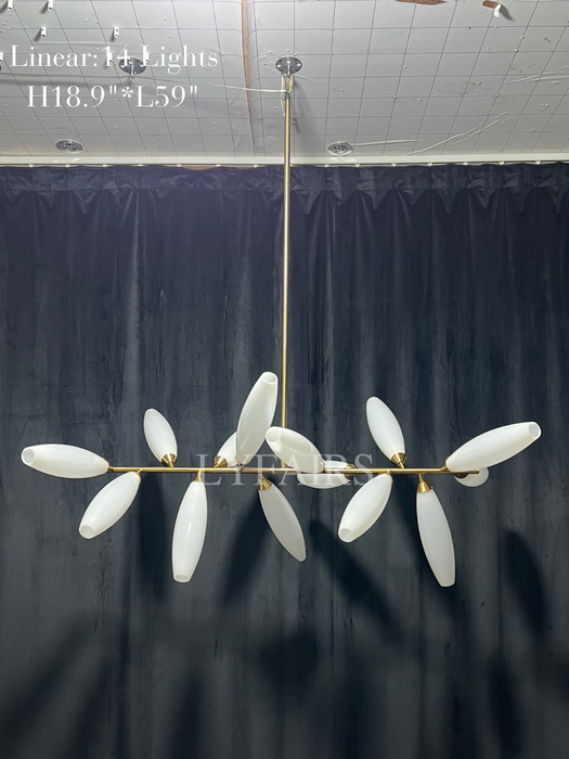 Lampadario minimalista in ferro a forma di chicco di riso lineare per sala da pranzo