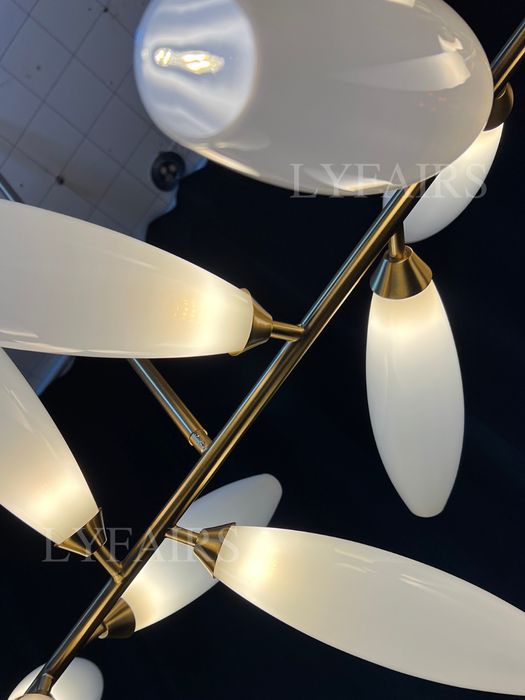 Lampadario minimalista in ferro a forma di chicco di riso lineare per sala da pranzo