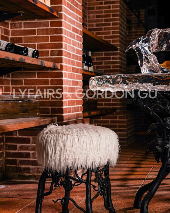LYFAIRS x GORDON GU Bodega Pouf with white fur and black grapevine leg
