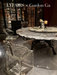 LYFAIRS x GORDON GU Bodega Round Glacier Crystal Dining Table with Rock Turntable and Black Grapevine Leg