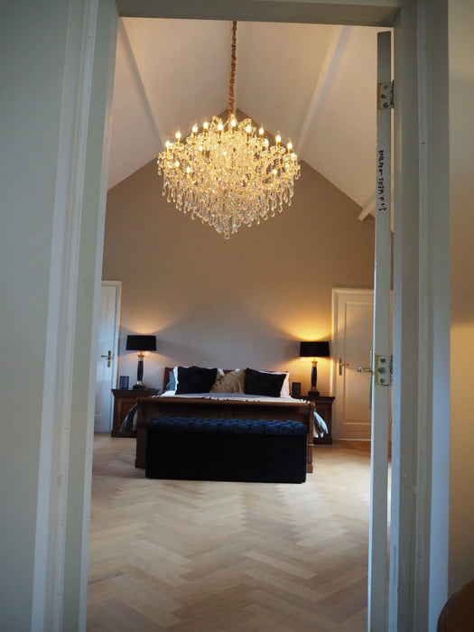 Lussuoso lampadario in cristallo a 25 luci con finitura oro/cromo