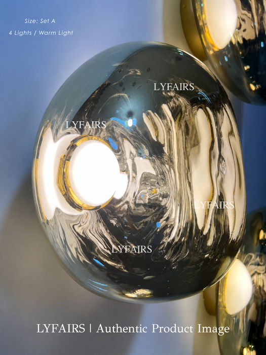 Modern Luxury Metallic Mirrored Irregular Lava Wall Sconce