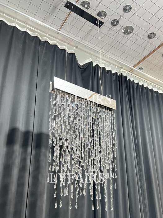 2023 nuovi modelli di design di lampadari di cristallo lunghi di lusso leggero creativo moderno con lampada da tavolo/bar