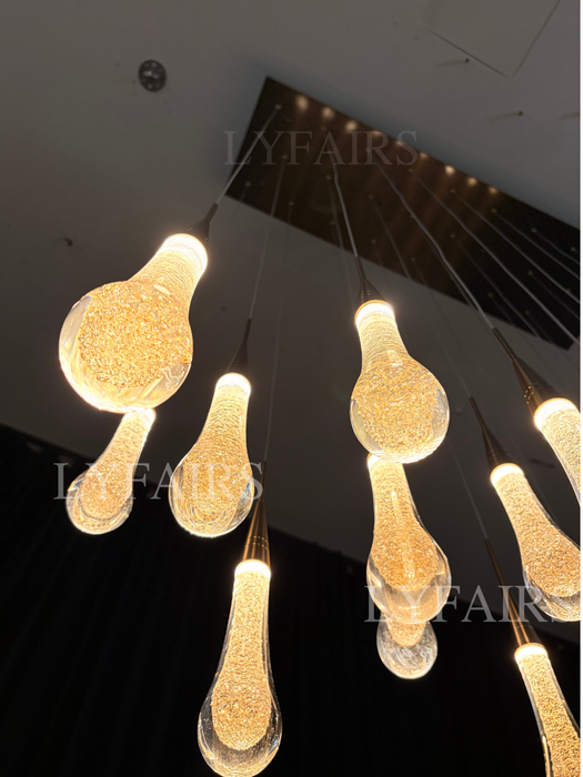 Lampadario moderno in cristallo lineare a cascata con goccia di pioggia per sala da pranzo/isola cucina