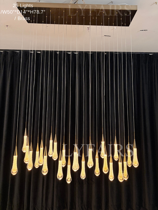 Lampadario moderno in cristallo lineare a cascata con goccia di pioggia per sala da pranzo/isola cucina