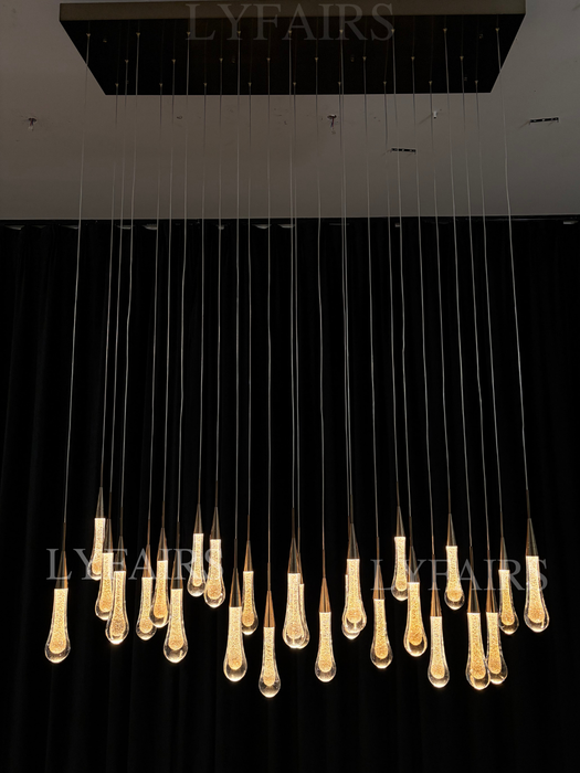 Lampadario moderno in cristallo lineare a cascata con goccia di pioggia per sala da pranzo/isola cucina
