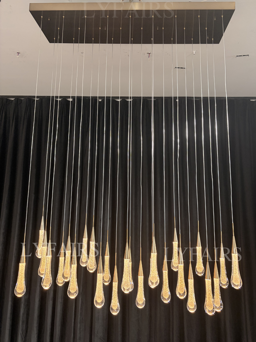 Lampadario moderno in cristallo lineare a cascata con goccia di pioggia per sala da pranzo/isola cucina