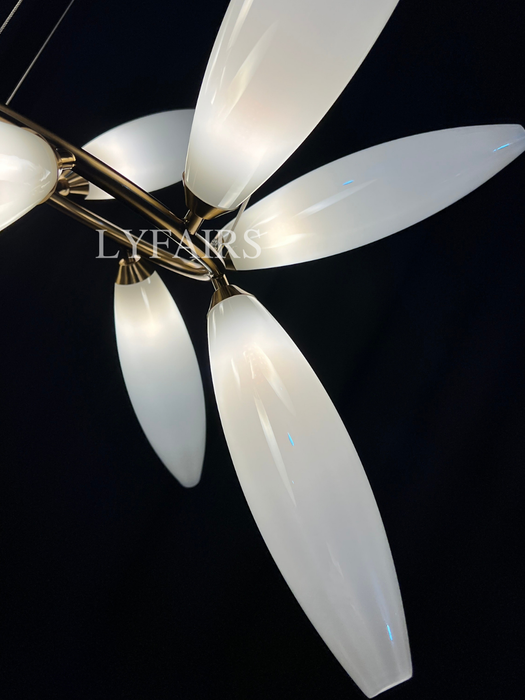 Lampadario minimalista in ferro a forma di chicco di riso lineare per sala da pranzo