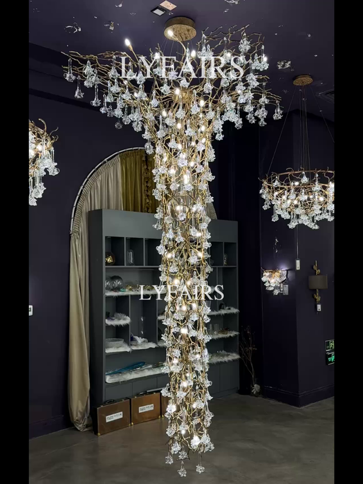 Nature-inspired Brass Tree Chandelier with Glazed Glass Flowers