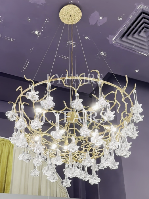 Nature-inspired Brass Tree Chandelier with Glazed Glass Flowers