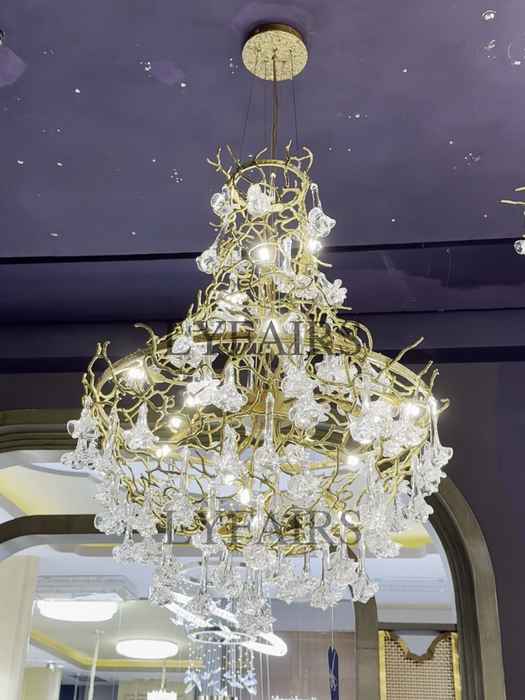 Nature-inspired Brass Tree Chandelier with Glazed Glass Flowers