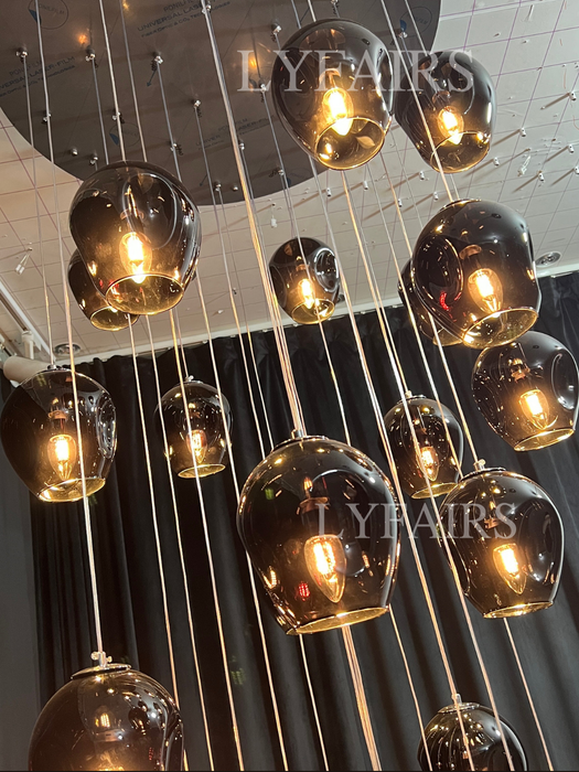 Lampadario di cristallo a spirale lunga di design nordico Lampadario decorativo di lusso moderno e leggero per scala/corridoio