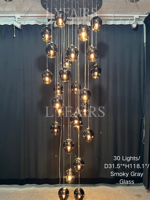 Lampadario di cristallo a spirale lunga di design nordico Lampadario decorativo di lusso moderno e leggero per scala/corridoio