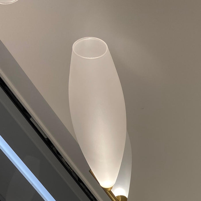 Lampadario minimalista in ferro a forma di chicco di riso lineare per sala da pranzo