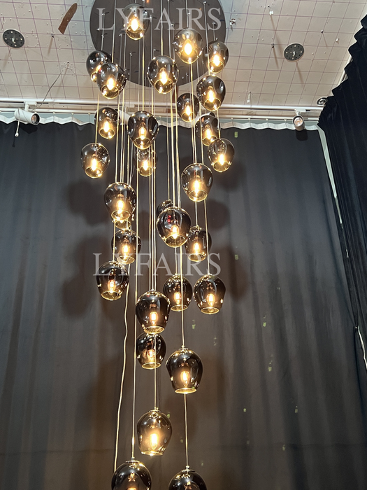 Lampadario di cristallo a spirale lunga di design nordico Lampadario decorativo di lusso moderno e leggero per scala/corridoio