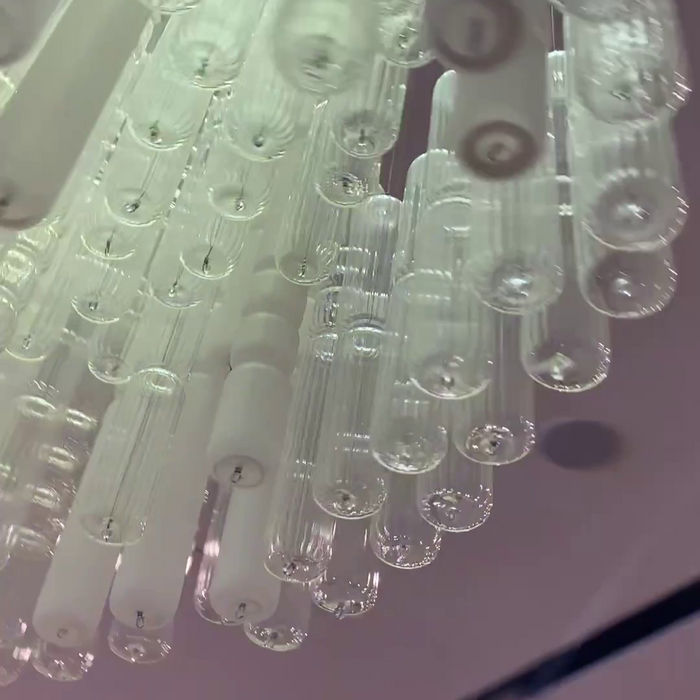 Lampadario a tubo bianco e trasparente dal design moderno e creativo per scale/atrio/soggiorno
