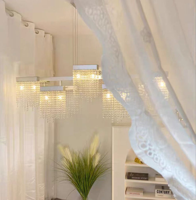 Modelos de diseño de luz larga con colgante de cristal con borlas de lujo extragrandes para comedor/sala de estar/isla de cocina