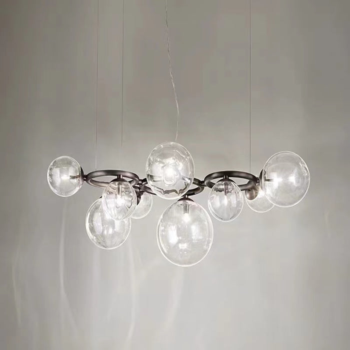 Lámpara colgante minimalista moderna con múltiples esferas de cristal transparente para sala de estar/comedor