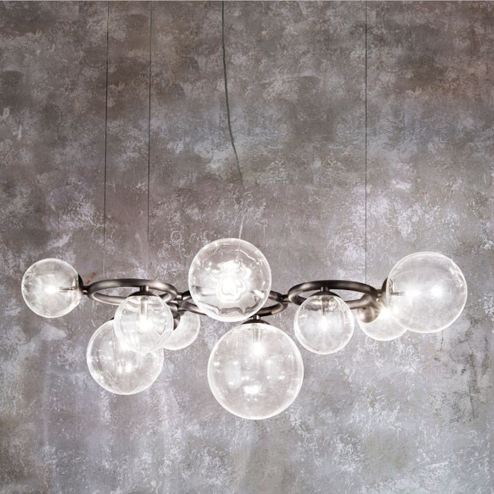 Lámpara colgante minimalista moderna con múltiples esferas de cristal transparente para sala de estar/comedor