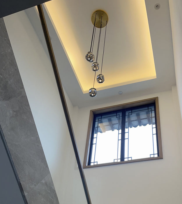 Lámparas colgantes extralargas postmodernas para escaleras/espacios de techos altos/vestíbulos