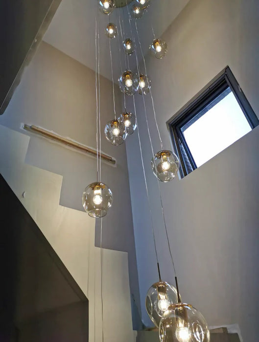 Lampadario di cristallo a spirale lunga di design nordico Lampadario decorativo di lusso moderno e leggero per scala/corridoio